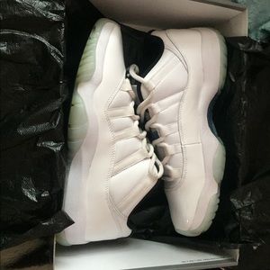 White and blue Jordan 11s
